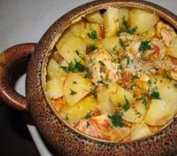 Chicken in a pot in the oven with potatoes